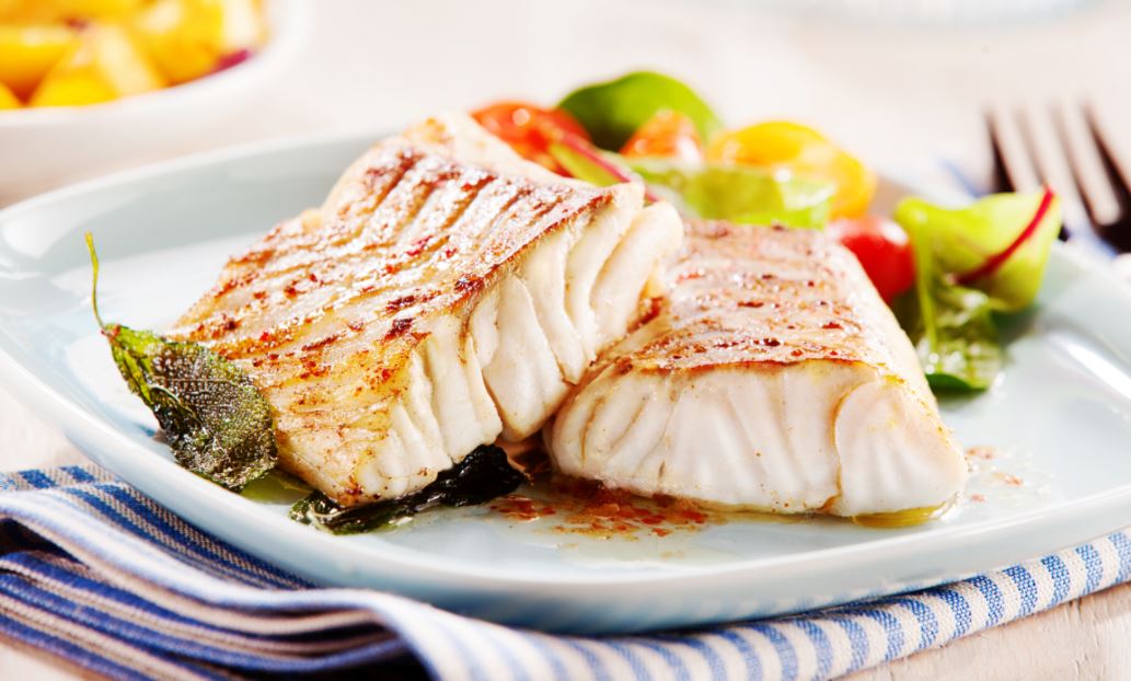 Merluza al horno con verduras.